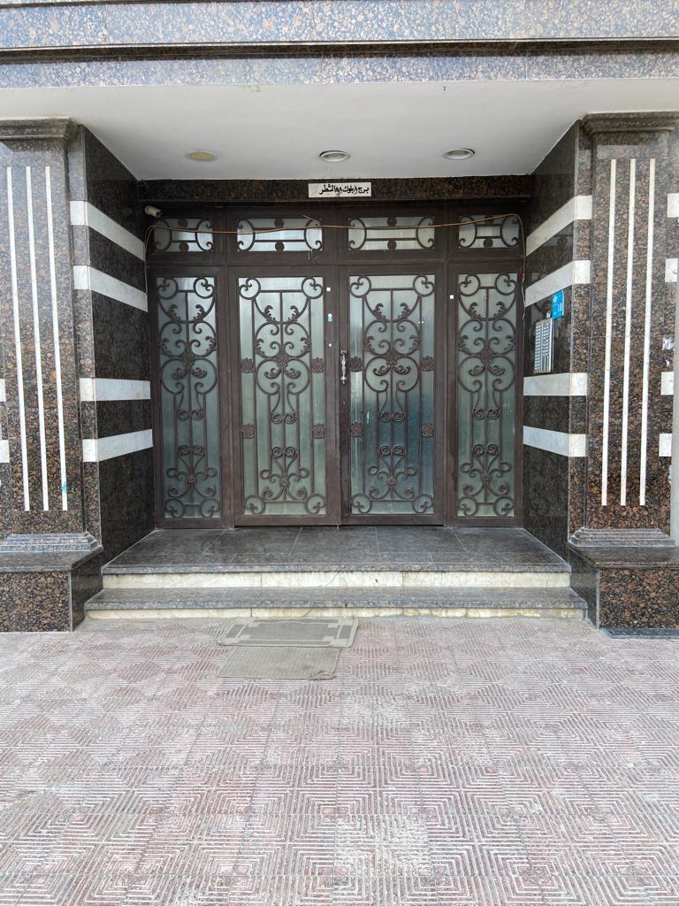 Building entrance with iron doors